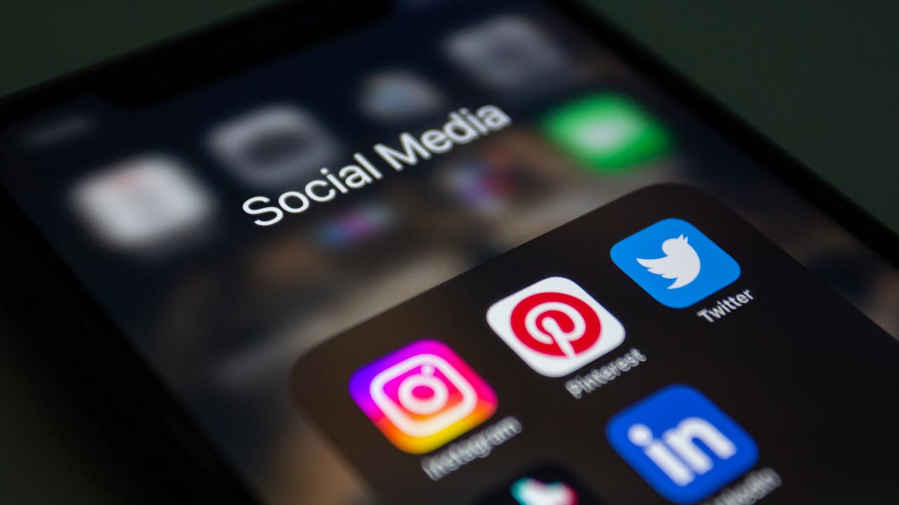 about-01 A smartphone screen displaying popular social media applications like Instagram and Twitter.